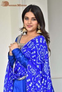 Nidhhi Agerwal in a blue salwar kameez dress