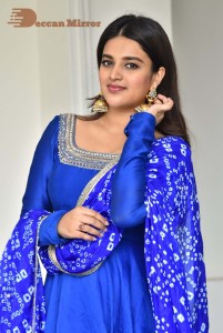Nidhhi Agerwal in a blue salwar kameez dress
