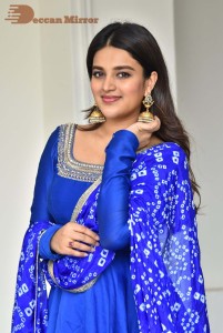 Nidhhi Agerwal in a blue salwar kameez dress