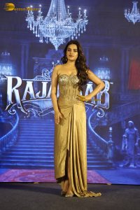 actress nidhi agarwal gorgeous in a gold color dress