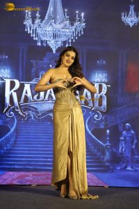 actress nidhi agarwal gorgeous in a gold color dress