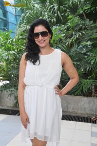 actress Niharica Raizada dressed in a white mini skirt