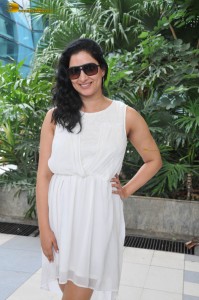 actress Niharica Raizada dressed in a white mini skirt