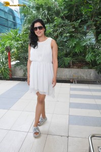 actress Niharica Raizada dressed in a white mini skirt