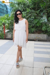 actress Niharica Raizada dressed in a white mini skirt