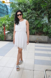 actress Niharica Raizada dressed in a white mini skirt