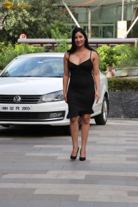 actress Niharica Raizada sexy looks in a short black noodle strap dress