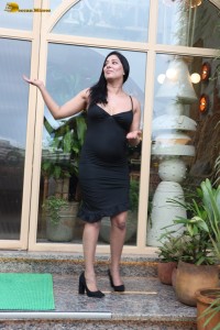 actress Niharica Raizada sexy looks in a short black noodle strap dress