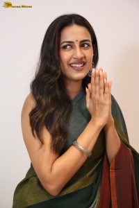 actress and producer Niharika Konidela cute in a dark green saree