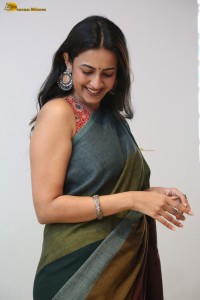 actress and producer Niharika Konidela cute in a dark green saree