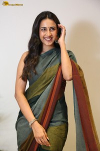 actress and producer Niharika Konidela cute in a dark green saree