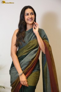 actress and producer Niharika Konidela cute in a dark green saree