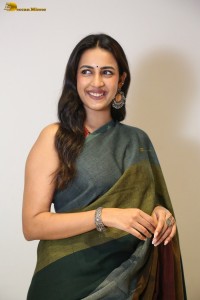 actress and producer Niharika Konidela cute in a dark green saree