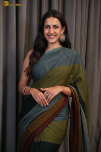 actress and producer Niharika Konidela cute in a dark green saree