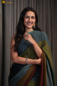 actress and producer Niharika Konidela cute in a dark green saree