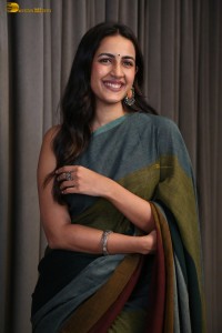 actress and producer Niharika Konidela cute in a dark green saree