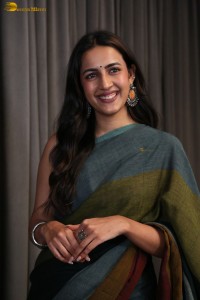 actress and producer Niharika Konidela cute in a dark green saree
