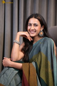 actress and producer Niharika Konidela cute in a dark green saree
