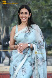actress and producer Niharika Konidela in a light blue saree