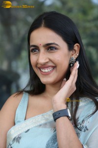 actress and producer Niharika Konidela in a light blue saree