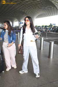 actress nikita dutta in white tracks at mumbai airport