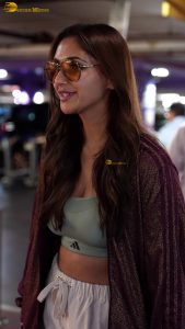 actress nikita dutta stylish in a coat and sunglasses