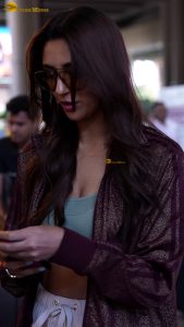 actress nikita dutta stylish in a coat and sunglasses