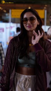 actress nikita dutta stylish in a coat and sunglasses