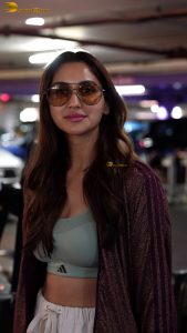 actress nikita dutta stylish in a coat and sunglasses