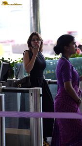 actress nikki tamboli pretty in a black dress at airport