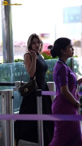 actress nikki tamboli pretty in a black dress at airport