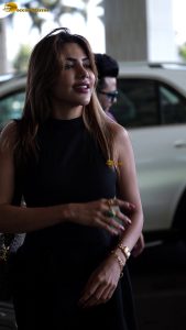 actress nikki tamboli pretty in a black dress at airport