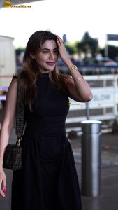 actress nikki tamboli pretty in a black dress at airport