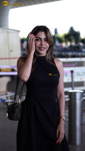 actress nikki tamboli pretty in a black dress at airport
