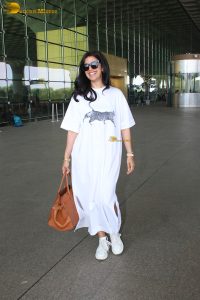 actress Nimrat Kaur pretty in all white at mumbai airport