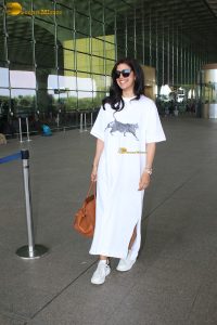 actress Nimrat Kaur pretty in all white at mumbai airport