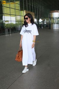 actress Nimrat Kaur pretty in all white at mumbai airport