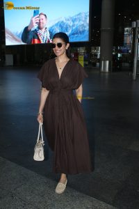 actress Nimrat Kaur beautiful in a brown dress