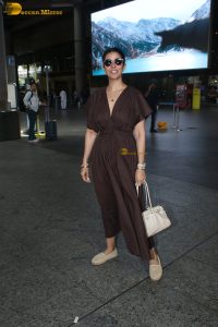 actress Nimrat Kaur beautiful in a brown dress