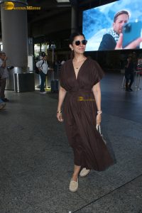 actress Nimrat Kaur beautiful in a brown dress