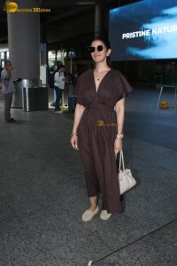actress Nimrat Kaur beautiful in a brown dress