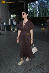 actress Nimrat Kaur beautiful in a brown dress
