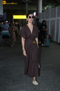 actress Nimrat Kaur beautiful in a brown dress