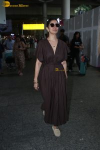 actress Nimrat Kaur beautiful in a brown dress