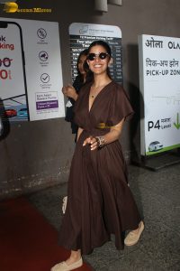 actress Nimrat Kaur beautiful in a brown dress