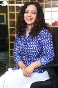 Actress Nithya Menen photoshoot in blue shirt and white trousers