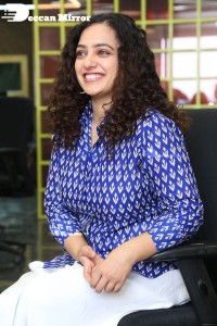 Actress Nithya Menen photoshoot in blue shirt and white trousers