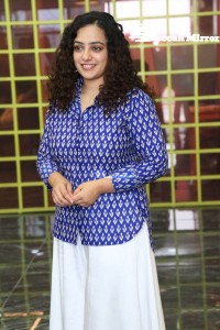 Actress Nithya Menen photoshoot in blue shirt and white trousers