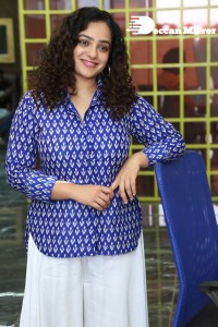 Actress Nithya Menen photoshoot in blue shirt and white trousers