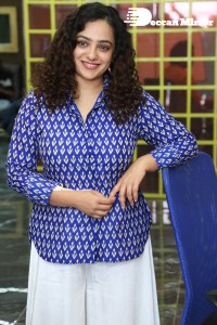 Actress Nithya Menen photoshoot in blue shirt and white trousers